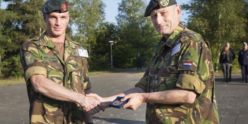 Gouden legpenning voor Peter Mullenberg